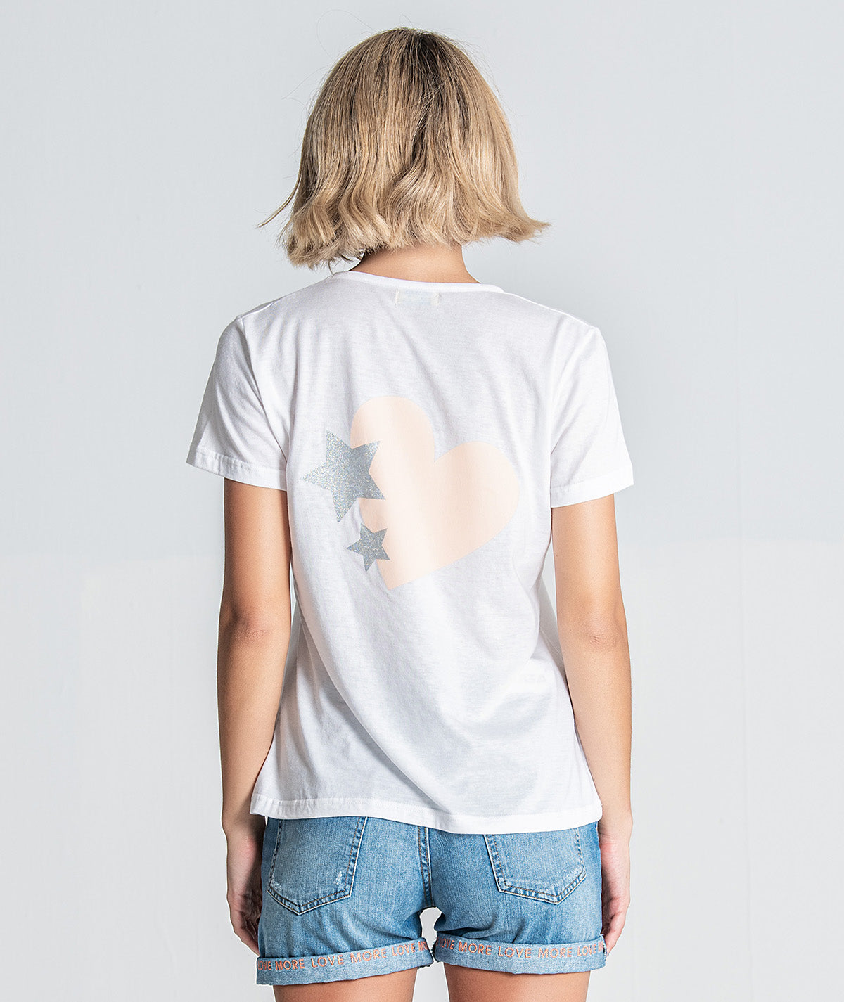 T‐shirt com decote V motivo nas
costas T049